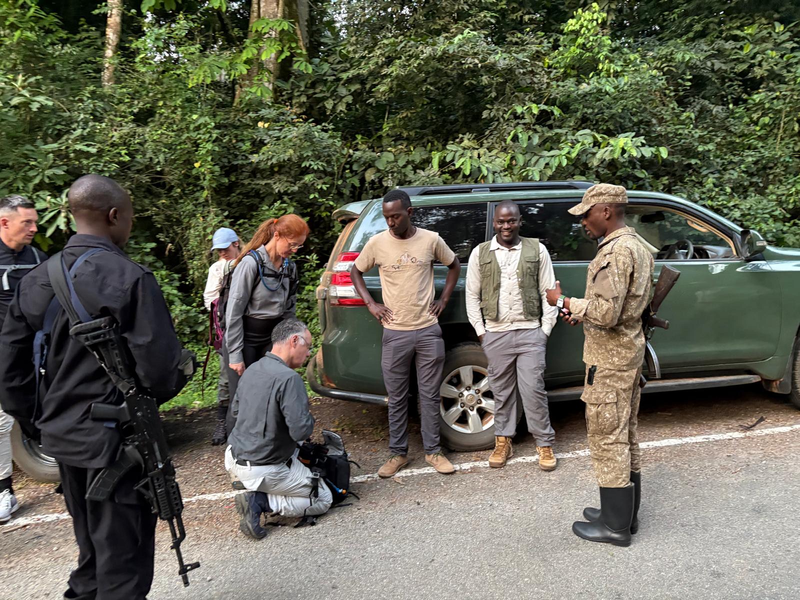 Primate trekking guide with tourists